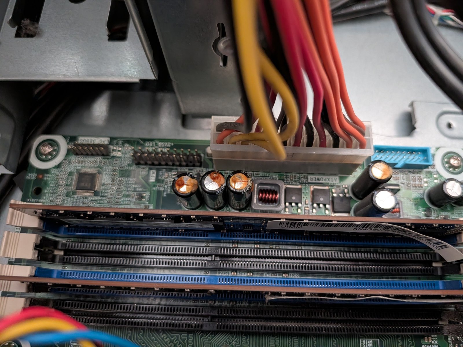 The board from the dead desktop The inside of the machine that burned out. Its drive was the first one I read.